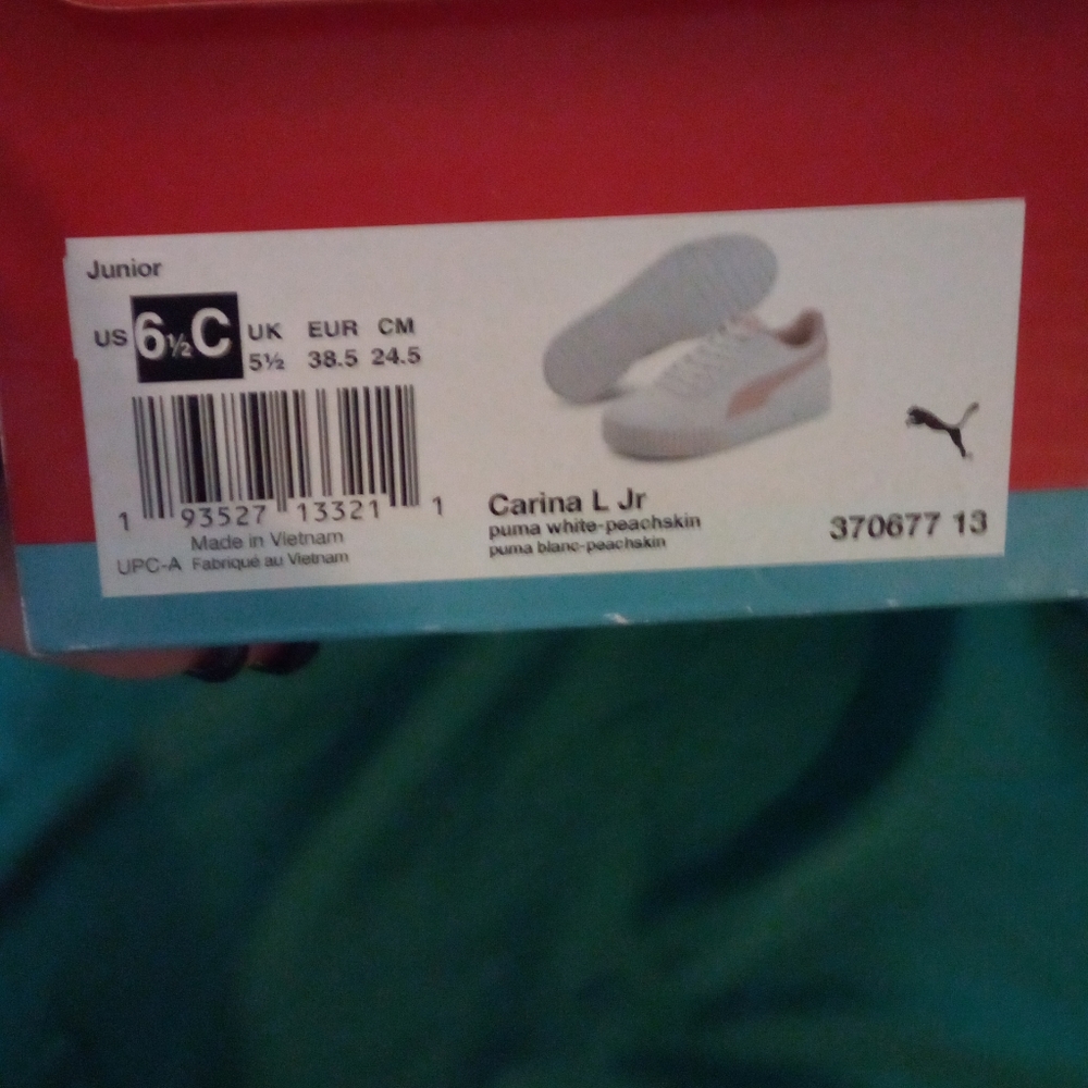 Puma size 6 youth apricot color with white worn three times in  great condition.